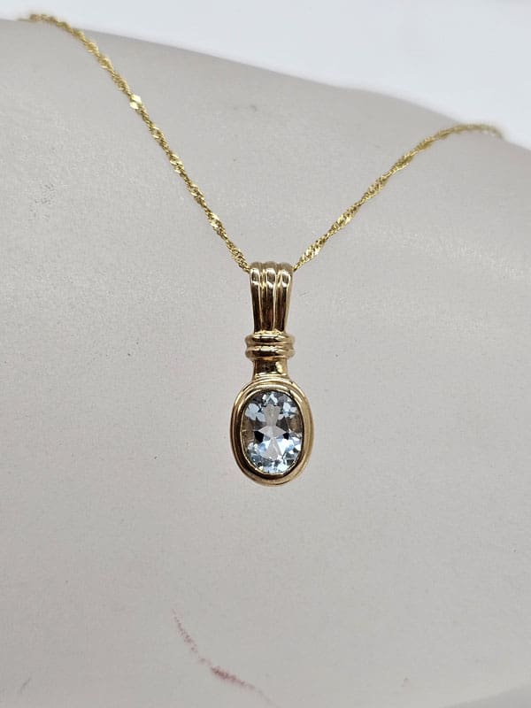 9ct Yellow Gold Topaz Oval Bezel Set Pendant on Gold Chain