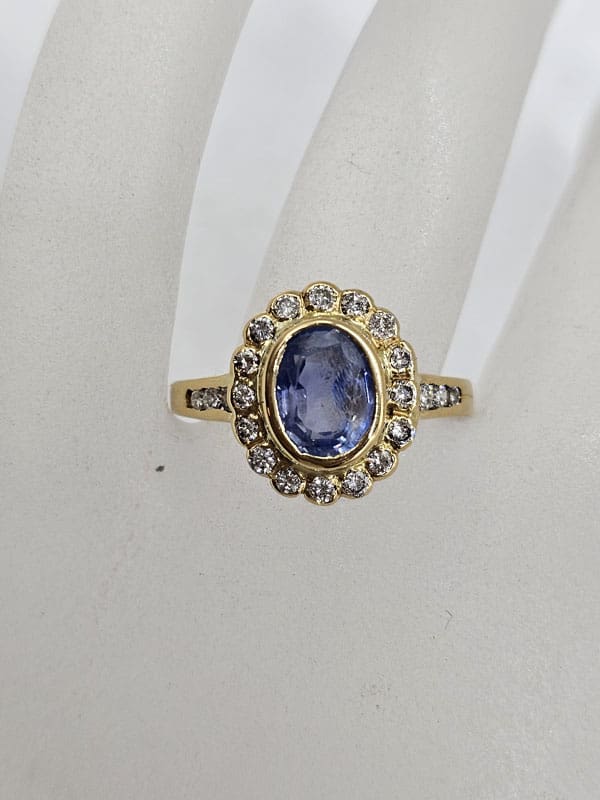 18ct Yellow Gold Natural Sapphire Surrounded by Diamond Oval Cluster Ring