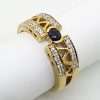 single black sapphire and diamonds on 9carat gold ring