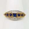 square blue sapphire with 6 rounds sapphires on 9ct gold ring