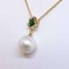 Pearl drop necklace with on gold chain and oval emerald