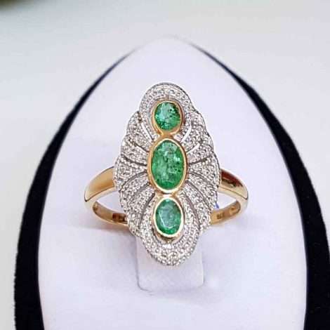 9ct Gold oval ring- 3 oval Emeralds surrounded by Diamonds
