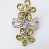 Sterling Silver Peridot flower ring with cubic zirconia
