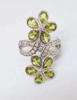 Sterling Silver Peridot flower ring with cubic zirconia