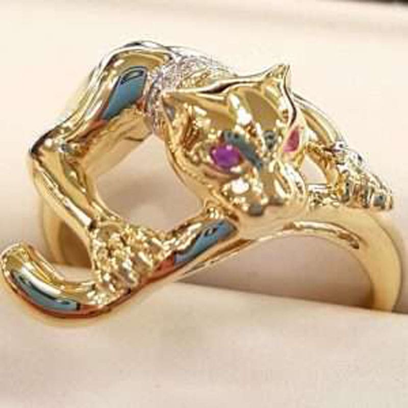Jaguar gold ring with ruby eyes