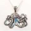 Sterling silver octopus necklace with amethyst eyes
