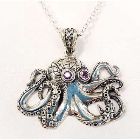 Sterling silver octopus necklace with amethyst eyes