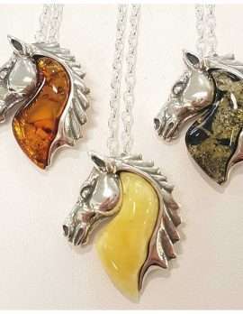 sterling silver and amber horse pendants