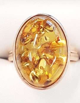 9ct Rose Gold Oval Amber Ring - Extendable