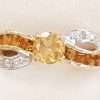 9ct Yellow Gold Channel Set Citrine and Diamond Twist Ring
