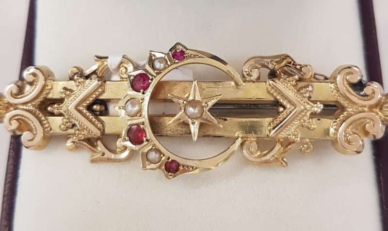 20200304_175345 9ct Yellow Gold Ruby and Seedpearl Ornate Crescent and Star Bar Brooch