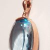 9ct Rose Gold Large Oval Blue Topaz Pendant on 9ct Chain