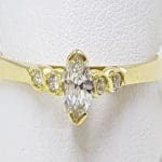 18ct Gold Marquis Cut Diamond with 4 Round Diamonds Engagement Ring
