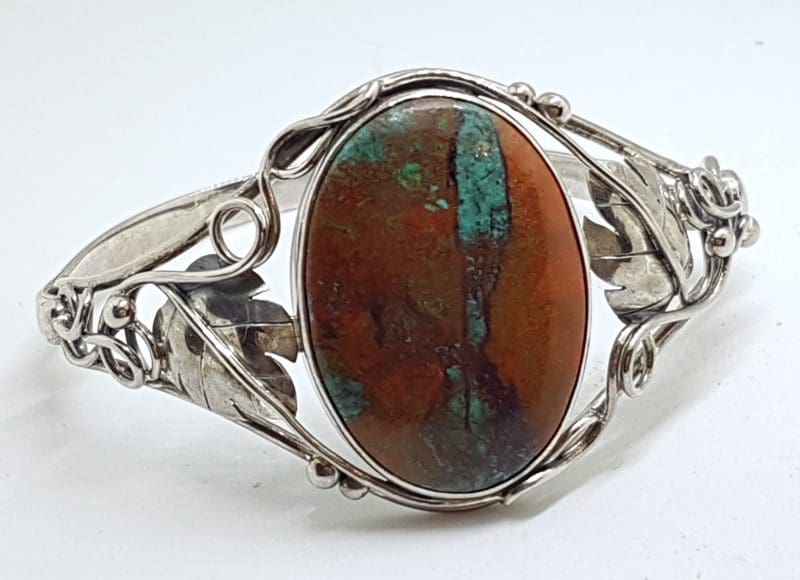 Sterling Silver Large Ornate Design Oval Chrysocolla Cuprite BangleSterling Silver Large Ornate Design Oval Chrysocolla Cuprite Bangle