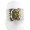 Sterling Silver Oval Green Amber Ring in Wide Beaten Design Band