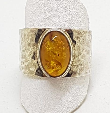 Sterling Silver Oval Natural Amber Ring - in Wide Beaten Design Ring