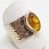 Sterling Silver Oval Natural Amber Ring - in Wide Beaten Design Ring