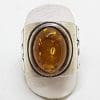 Sterling Silver Oval Natural Amber Ring - Chunky Ring with Ornate Design