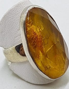 Sterling Silver Large Oval Faceted Natural Amber Ring