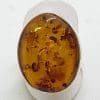 Sterling Silver Large Oval Natural Amber Ring