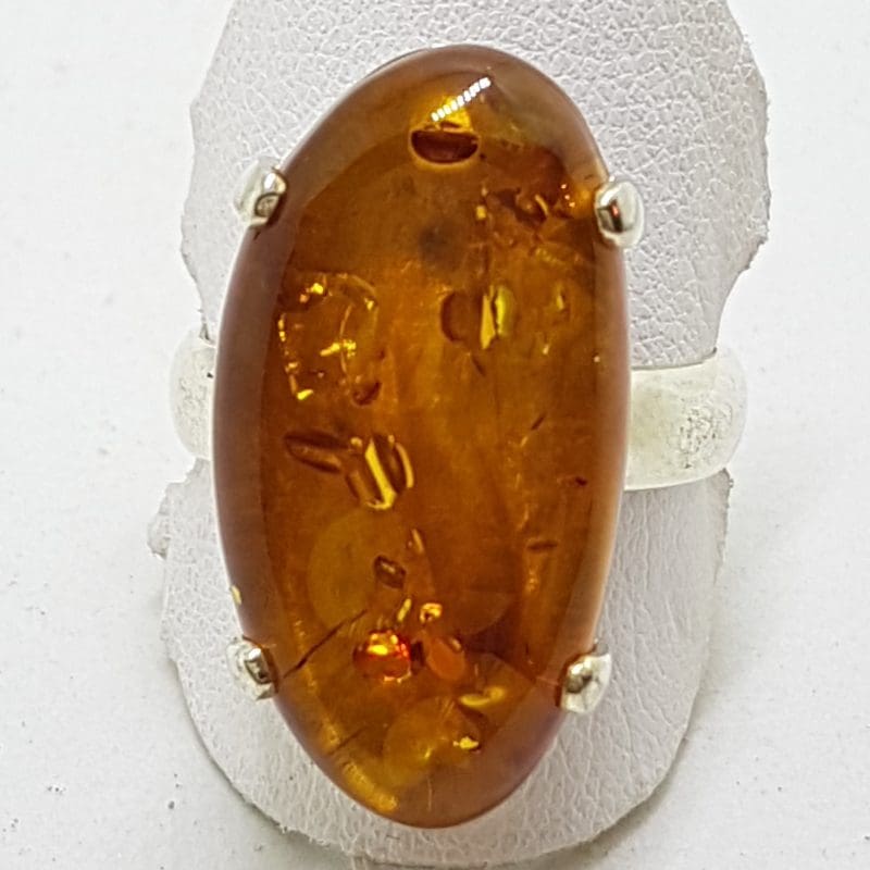 20200417_121324 Sterling Silver Large Natural Amber Ring - Claw Set