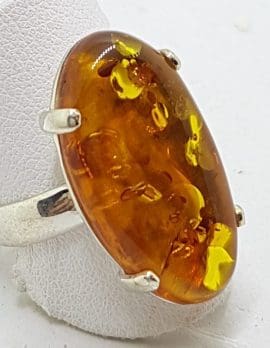 Sterling Silver Large Natural Amber Ring - Claw Set