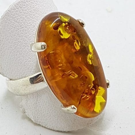 Sterling Silver Large Natural Amber Ring - Claw Set