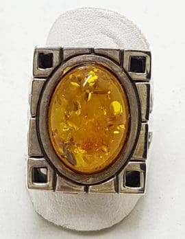 Sterling Silver Oval Natural Amber in Rectangular Ring