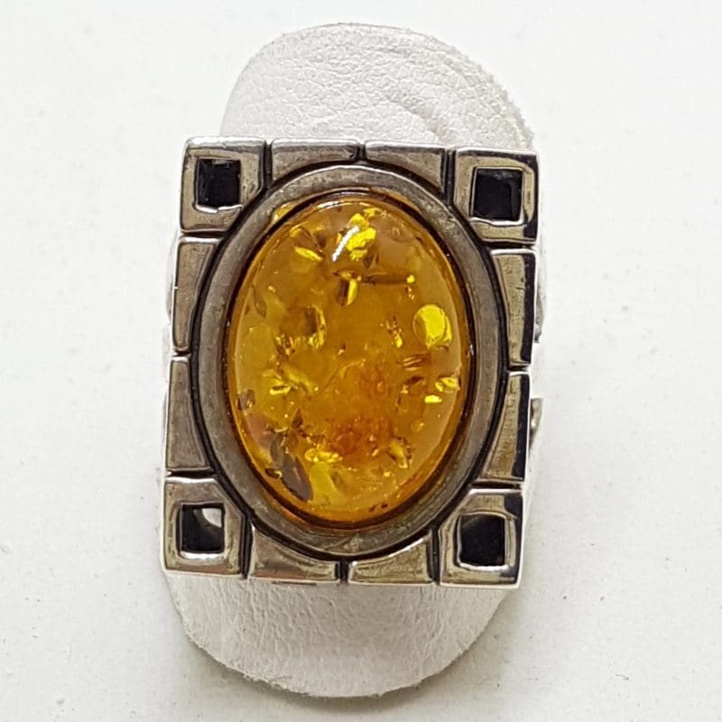 Sterling Silver Oval Natural Amber in Rectangular Ring