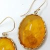 9ct Yellow Gold Large Oval Carved Floral Natural Amber Drop Earrings9ct Yellow Gold Large Oval Carved Floral Natural Amber Drop Earrings