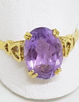 9ct Yellow Gold Large Oval Amethyst with Heart Design Ring