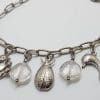 Sterling Silver Rose Quartz and Animal Charms Bracelet