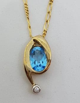 9ct Yellow Gold Oval Topaz & Diamond Curved Pendant on Gold Chain