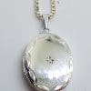 Sterling Silver Oval Diamond Locket Pendant on Sterling Silver Chain