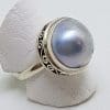 Sterling Silver Blue/Grey Mabe Pearl Ornate Rim Ring
