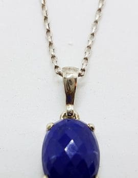 Sterling Silver Faceted Oval Claw Set Lapis Lazuli Pendant on Silver Chain