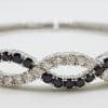 Sterling Silver Cubic Zirconia Black & White Weaved Pattern Oval Bangle