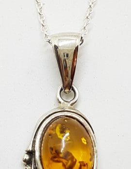 Sterling Silver Natural Amber Ornate Oval Pendant on Silver Chain
