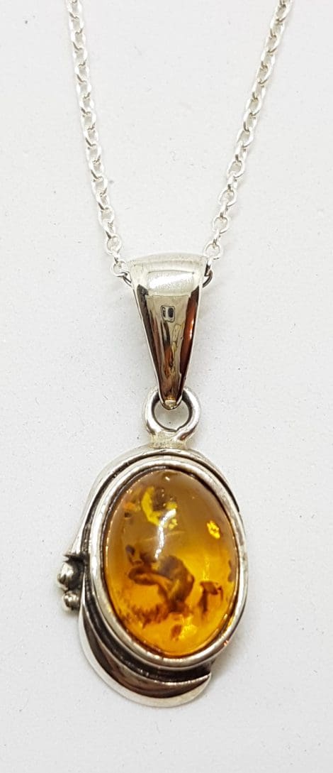 Sterling Silver Natural Amber Ornate Oval Pendant on Silver Chain