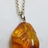 Sterling Silver Natural Amber Carved Pendant on Silver Chain