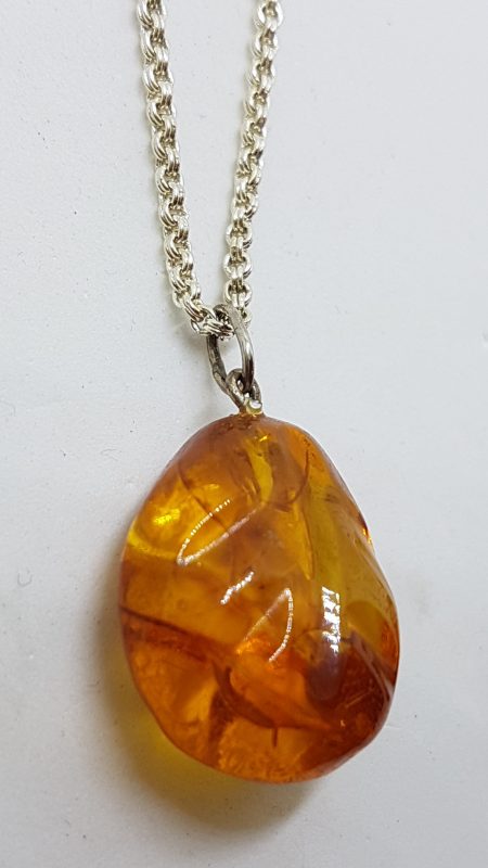 Sterling Silver Natural Amber Carved Pendant on Silver Chain