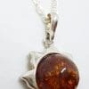 Sterling Silver Amber Sun Pendant on Silver Chain