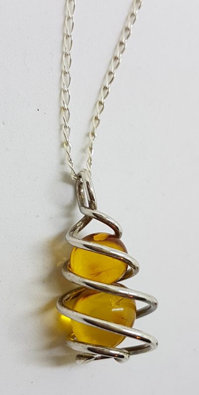 Sterling Silver Natural Amber Two Ball in Cage Pendant on Silver Chain