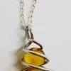 Sterling Silver Natural Amber Two Ball in Cage Pendant on Silver Chain