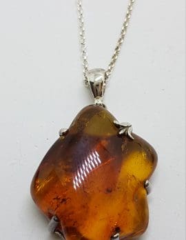 Sterling Silver Natural Amber Large Claw Set Pendant on Silver Chain