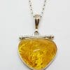 Sterling Silver Amber Hinged Pendant on Silver Chain