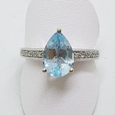 9ct White Gold Teardrop/Pear Shape Blue Topaz and Diamond Ring