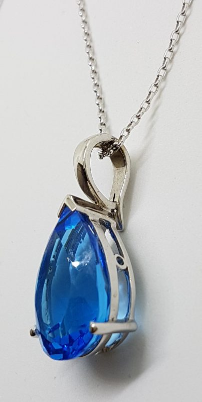 20200526_114451 9ct White Gold Large Teardrop Shape Blue Topaz Enhancer Pendant on Gold Chain