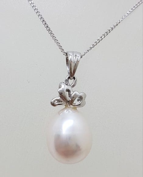9ct White Gold Pink Pearl Pendant on Gold Chain