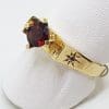 9ct Yellow Gold Garnet & Diamond Claw Set Ring